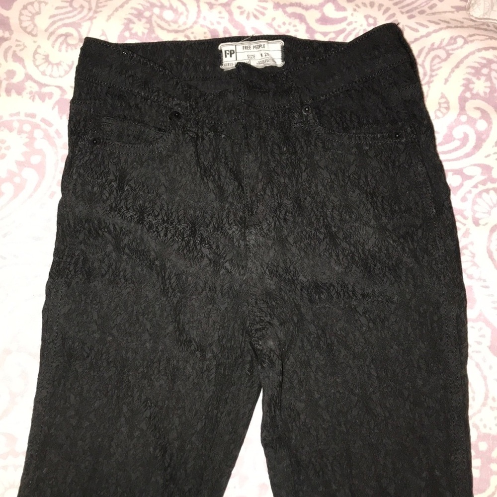 Free people black textured jeans.